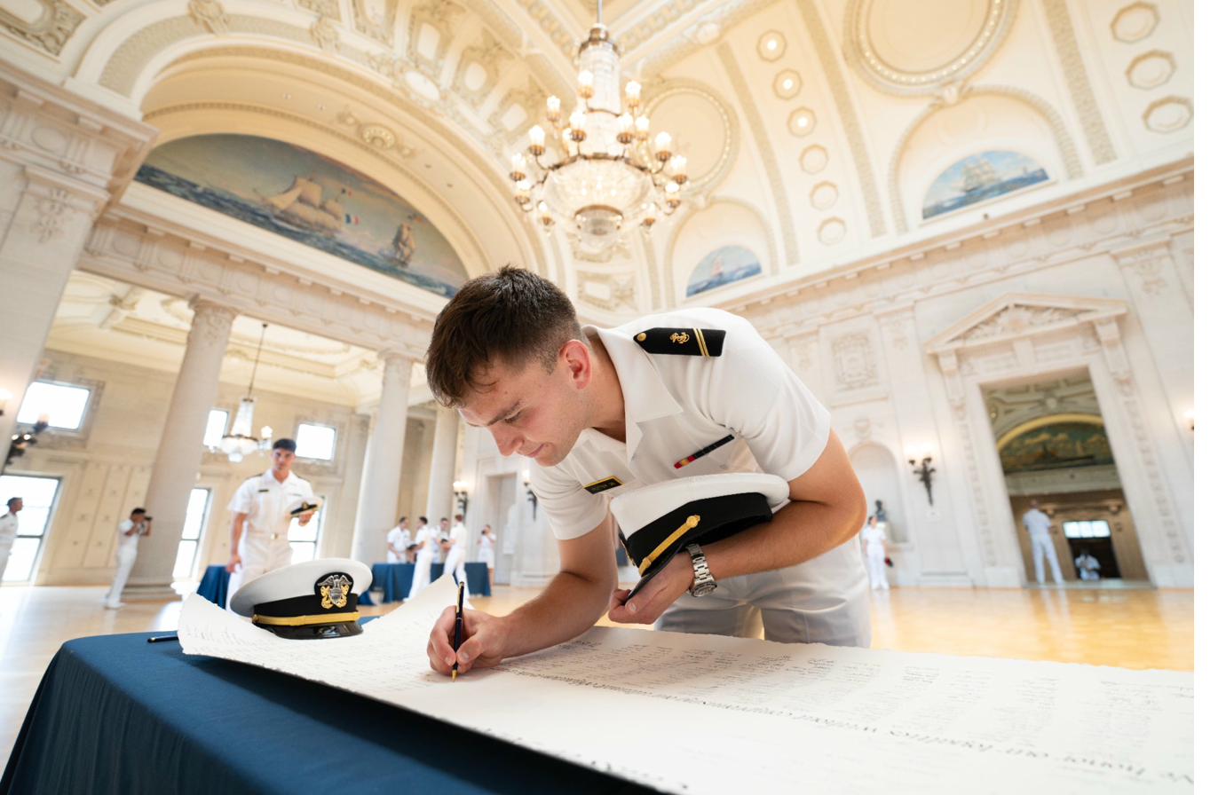 Signing ceremony at the Naval Academy